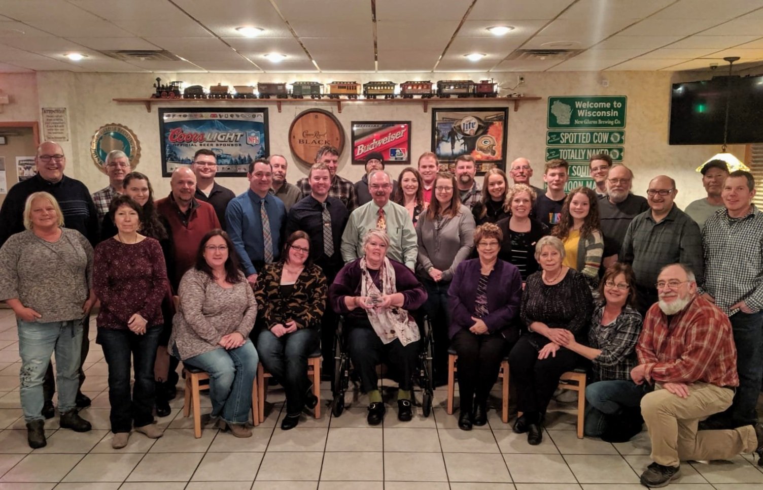 The staff of Scholze Ace Home Center pose for a group picture